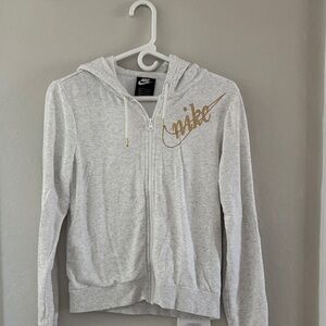 Nike Women's Light Gray Hoodie with Gold Accents